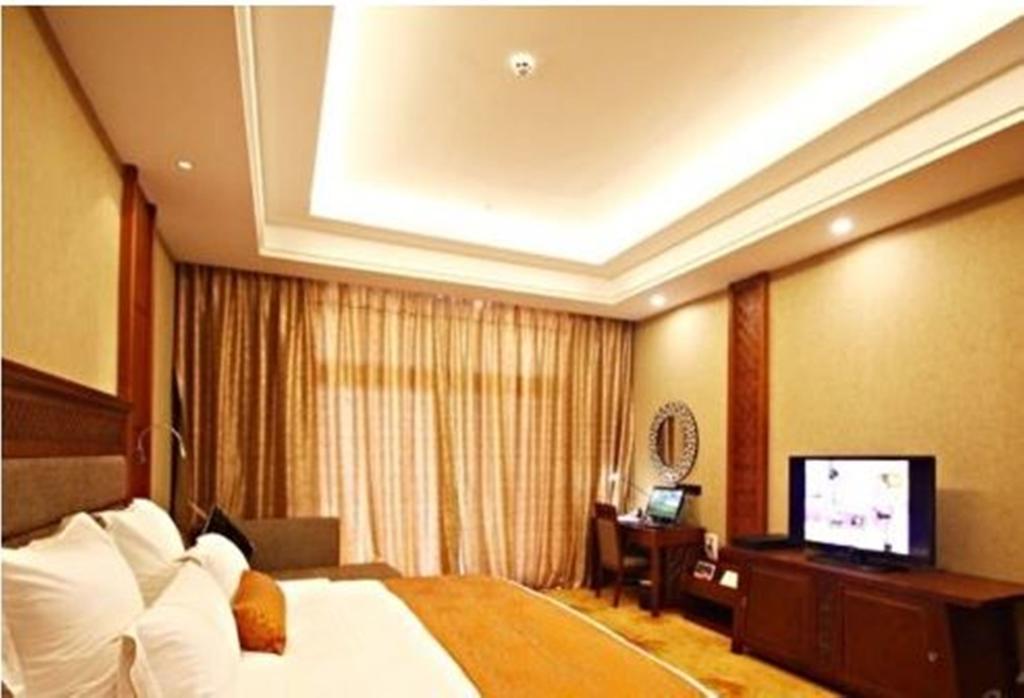 Отель Ramada Plaza Xishuangbanna Экстерьер фото