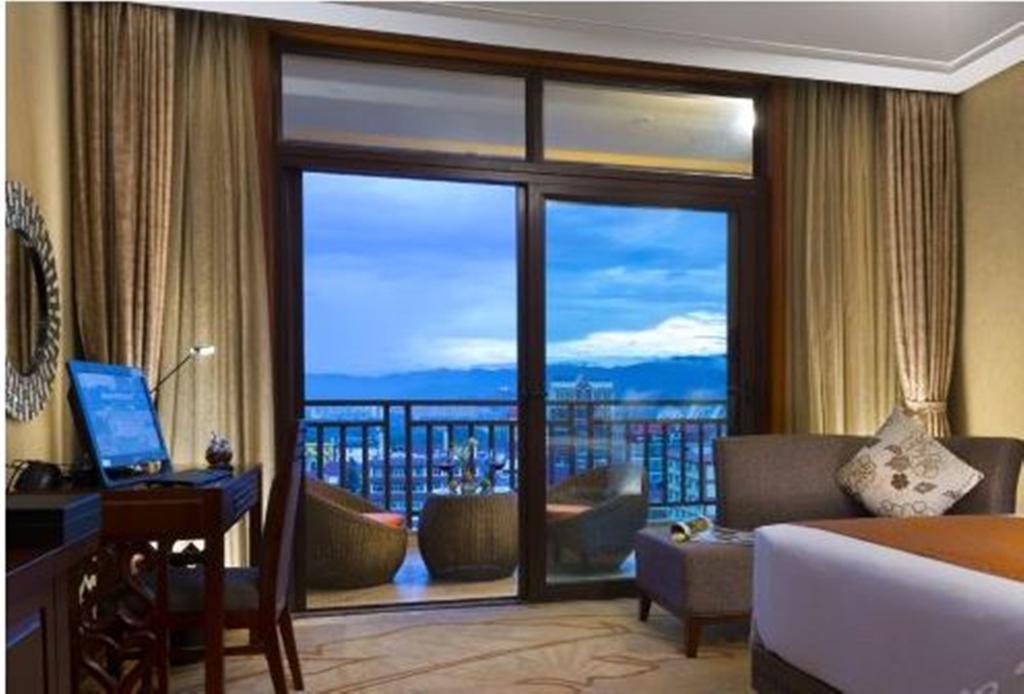 Отель Ramada Plaza Xishuangbanna Экстерьер фото