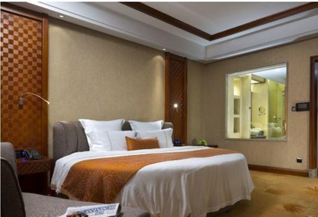 Отель Ramada Plaza Xishuangbanna Экстерьер фото